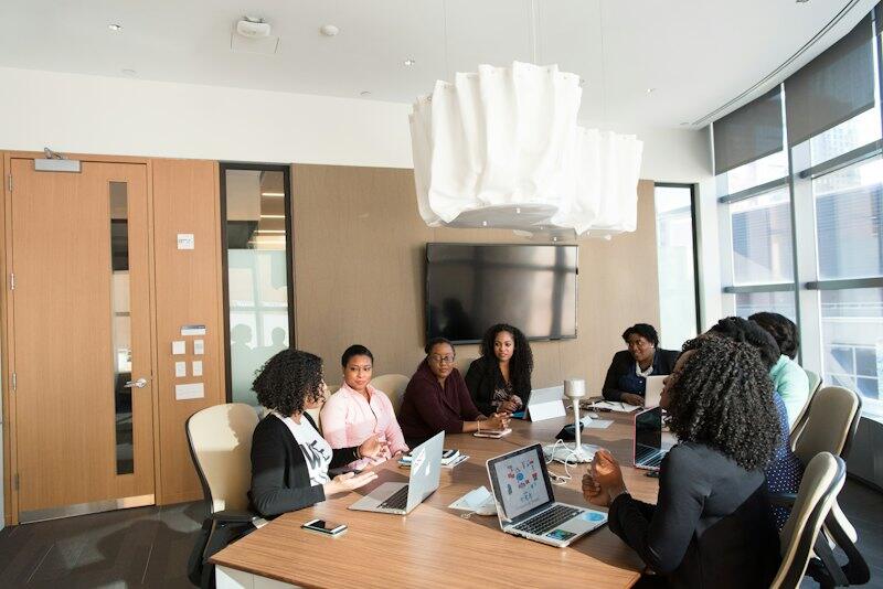 A team meeting around a boardroom table